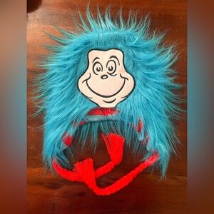 Dr. Seuss Red and Blue ear flap hat plus six iron on patches.